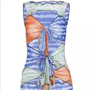 Sheer print dress with ties in the front.